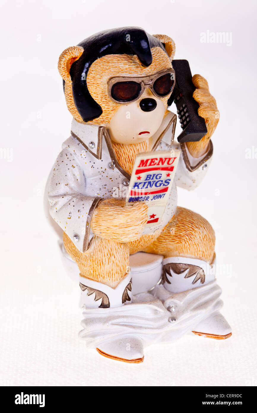 caricature bear as elvis sitting on toilet ordering a burger Stock Photo -  Alamy