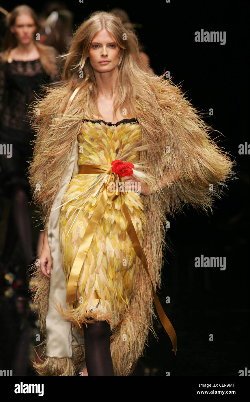 Roberto Cavalli Milan Ready to Wear S S Model Carmen Kass very long blonde  wavy hair wearing white ruffled sleeveless blouse Stock Photo - Alamy