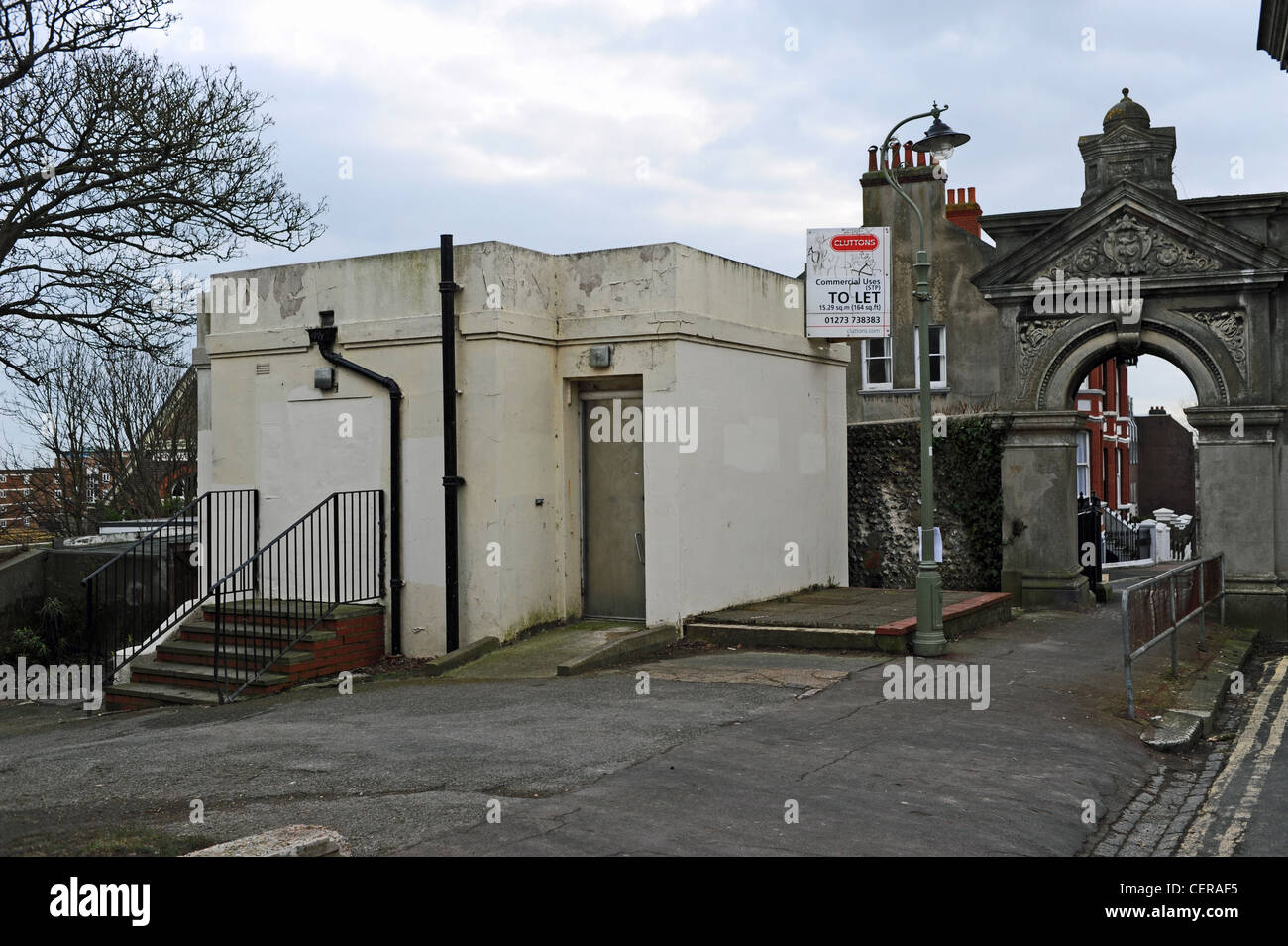 Old public toilets in Queens Park Brighton which has a planning notice
