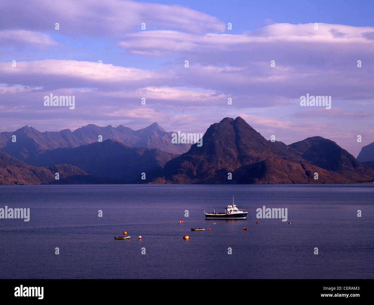 Sgurr na Stri and the main Cuillin ridge seen from Elgol.  The boat, Bella Jane, runs trips to Loch Coruisk in the heart of the Stock Photo