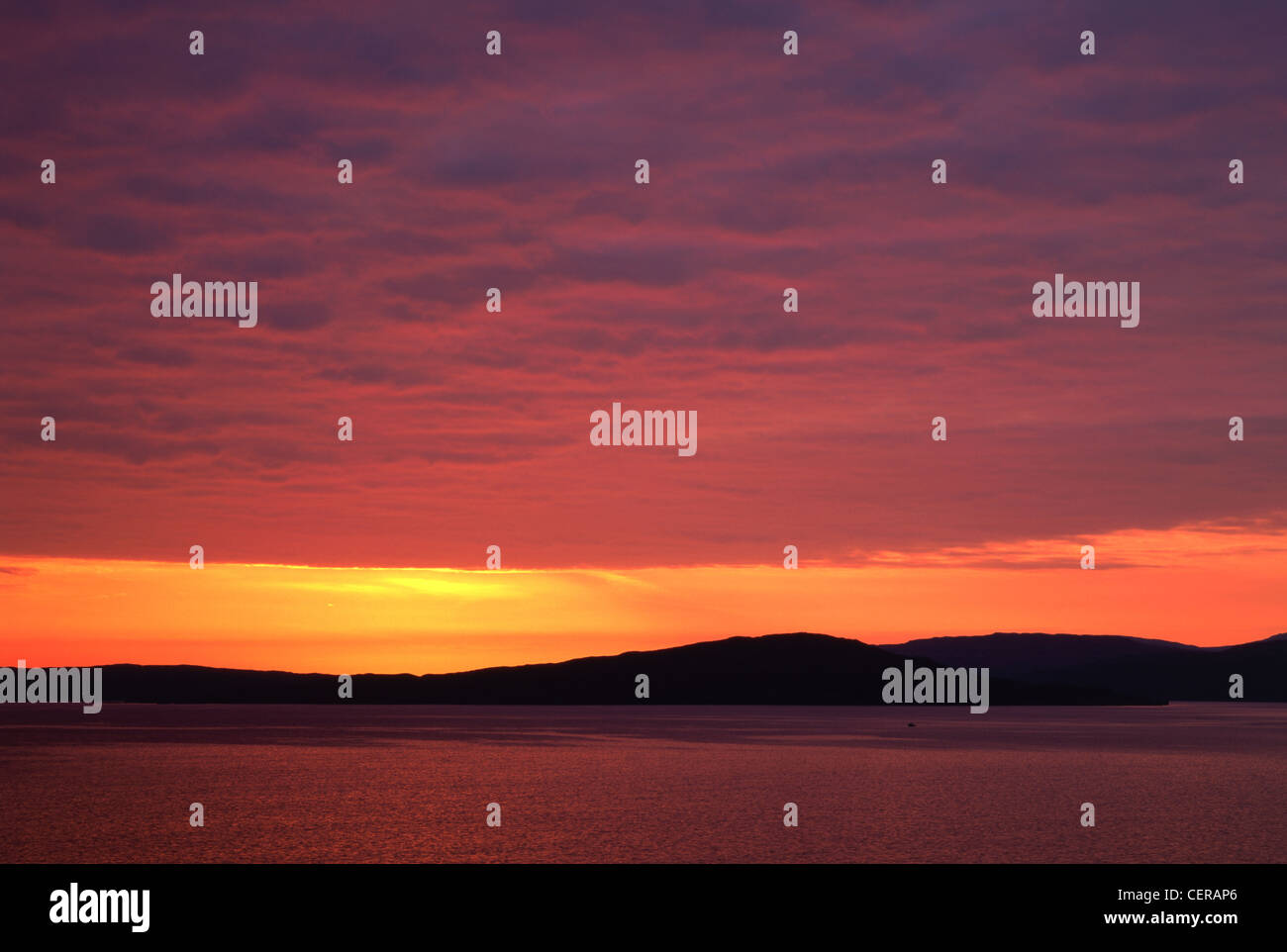 Sunset over the small island of Soay. Taken from Elgol. Stock Photo