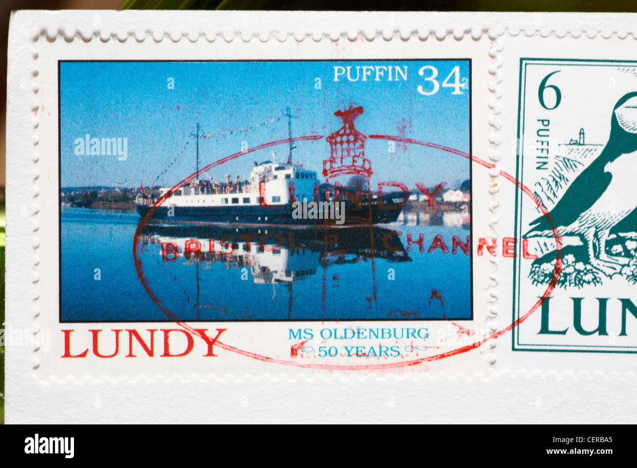 Lundy stamp on back of postcard celebrating MS Oldenburg 50 years Stock Photo