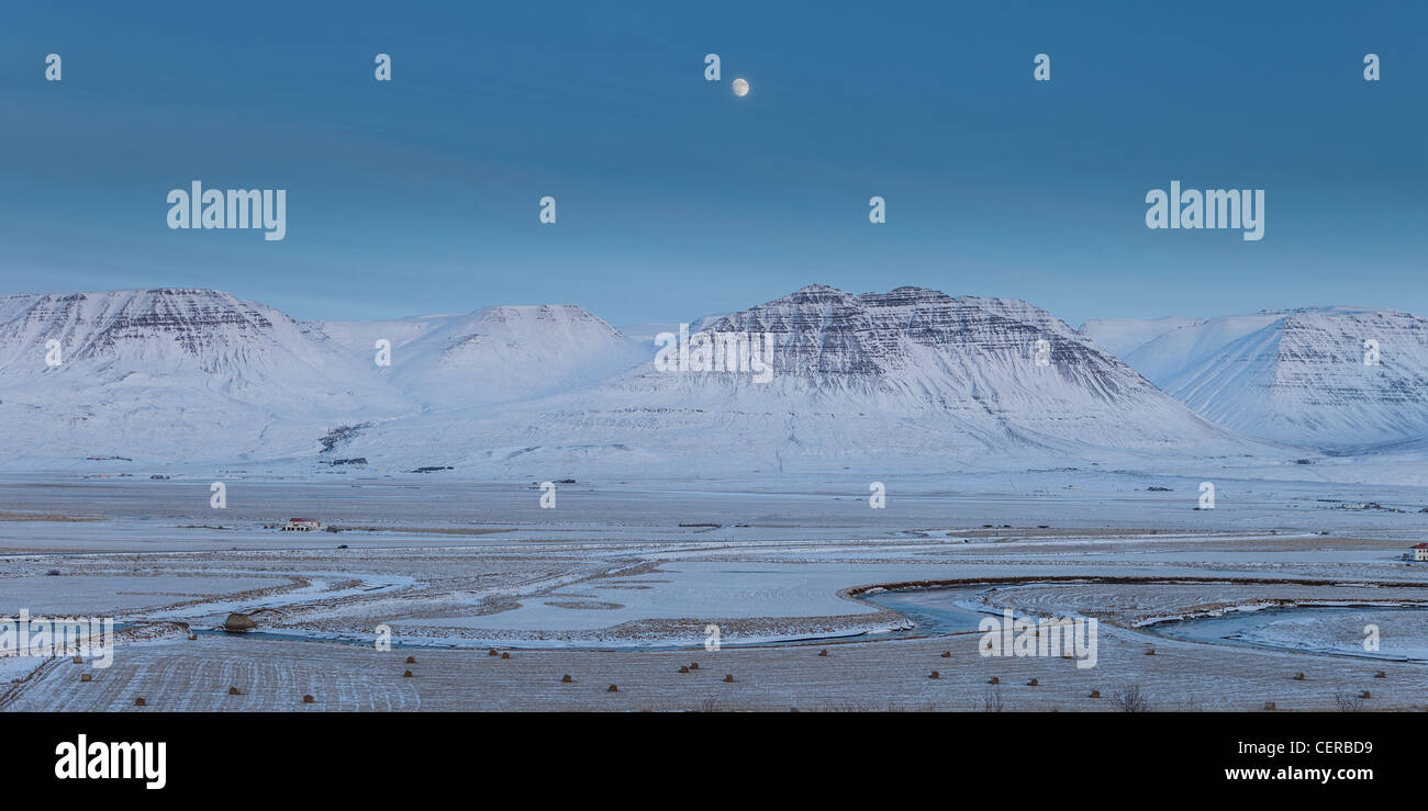 Moon with snowy winter landscape,  Skagafjordur, Iceland Stock Photo