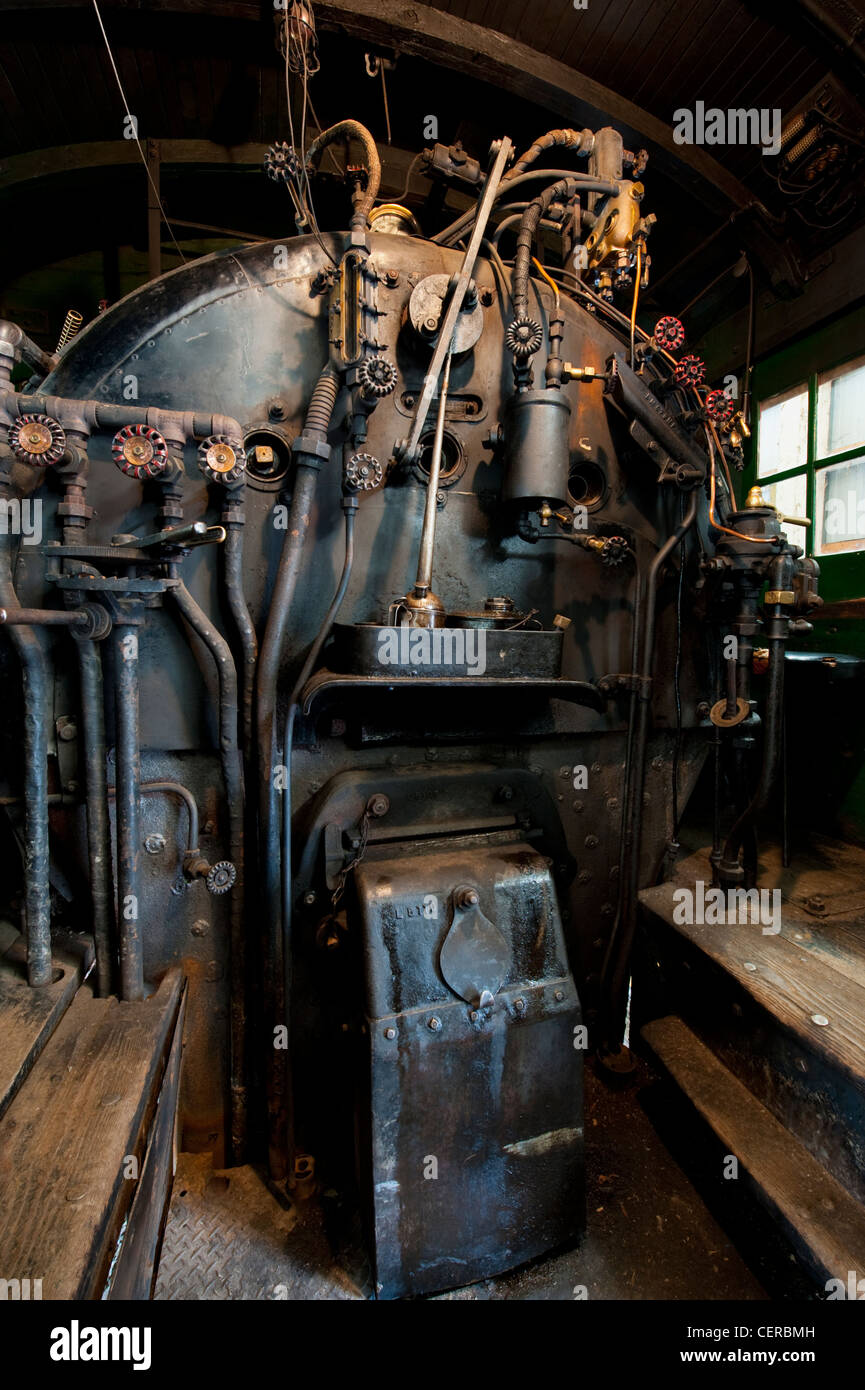 Interior of an antique steam engine that is 100 years old. It takes 3 ...