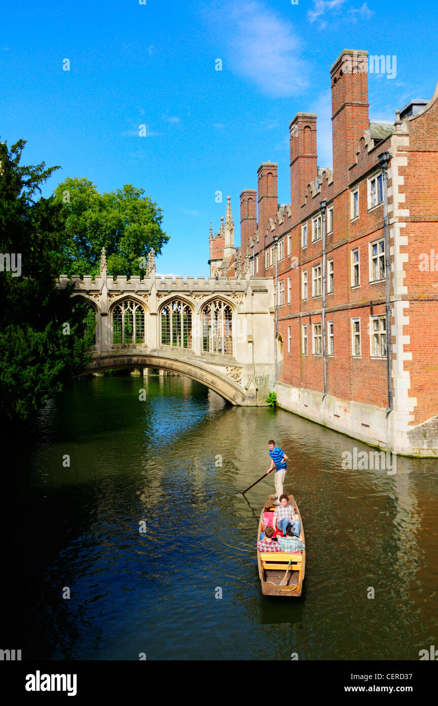 Punting on the River Cam by The Bridge of Sighs at St John's College. Stock Photo