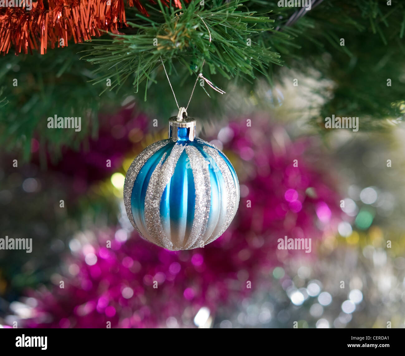 Christmas decoration in snow on background green pine Stock Photo