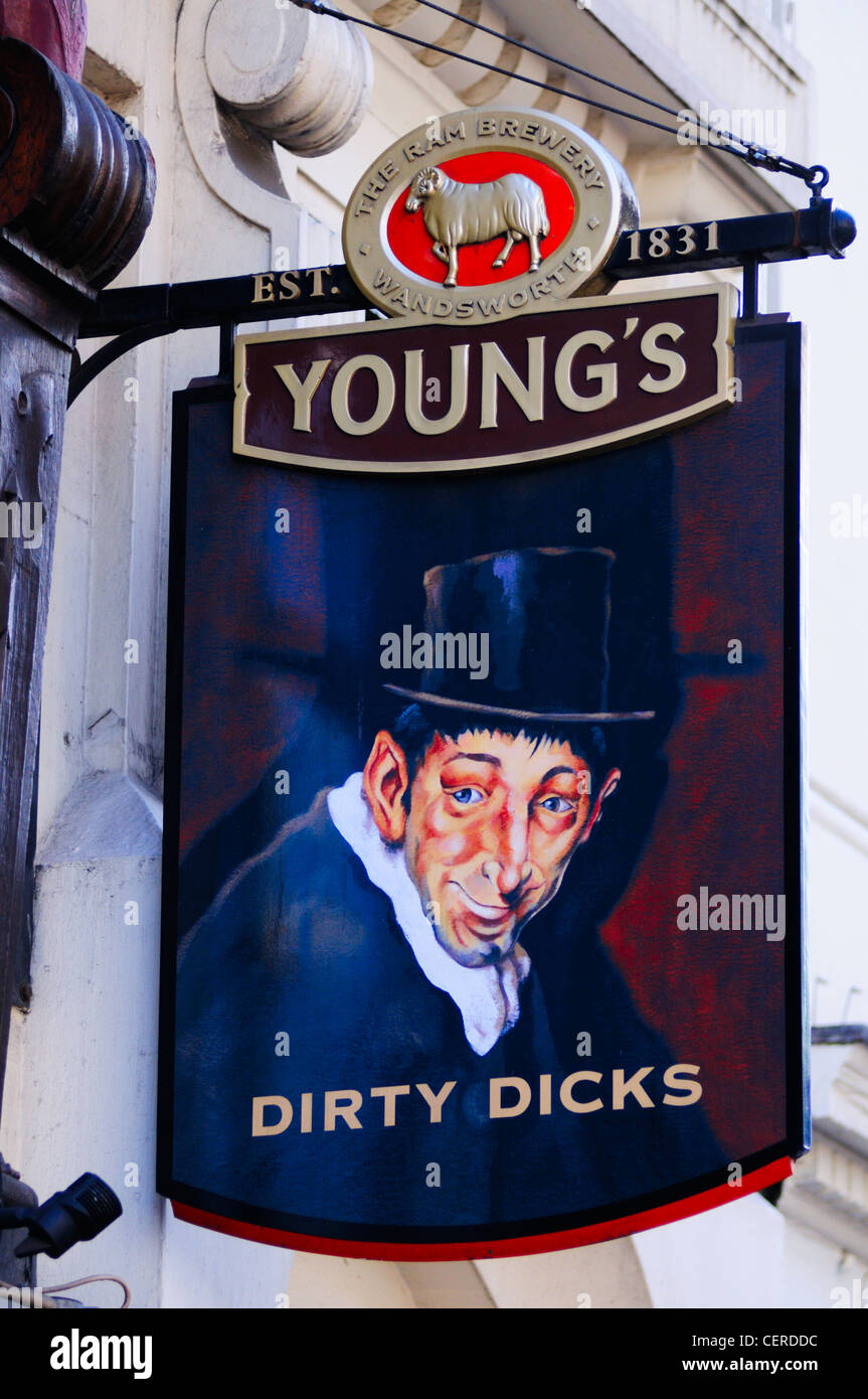 Dirty Dicks pub sign hanging outside the historic city pub on Bishopsgate. the pub takes its name from the dirty warehouse on Le Stock Photo