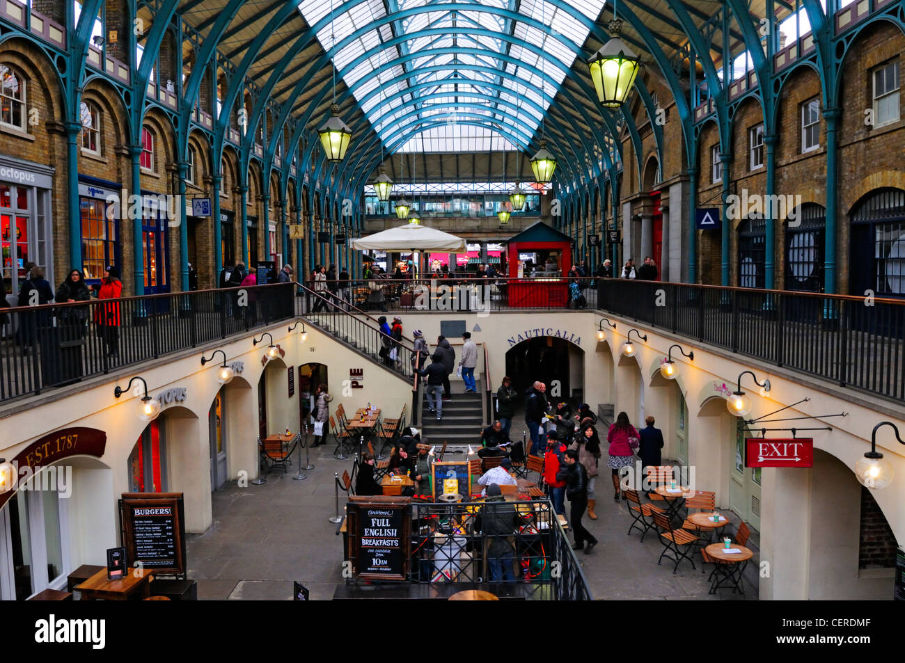 Shops and restaurants in the covered market designed in 1632 by Inigo Jones in the centre of Covent Garden. Stock Photo