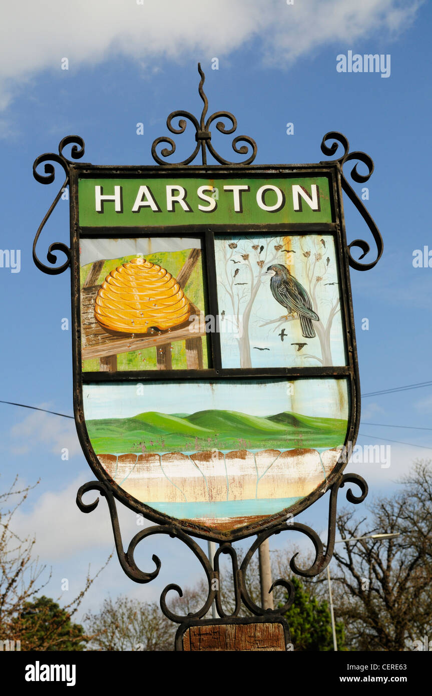 Harston village sign on the green. Stock Photo