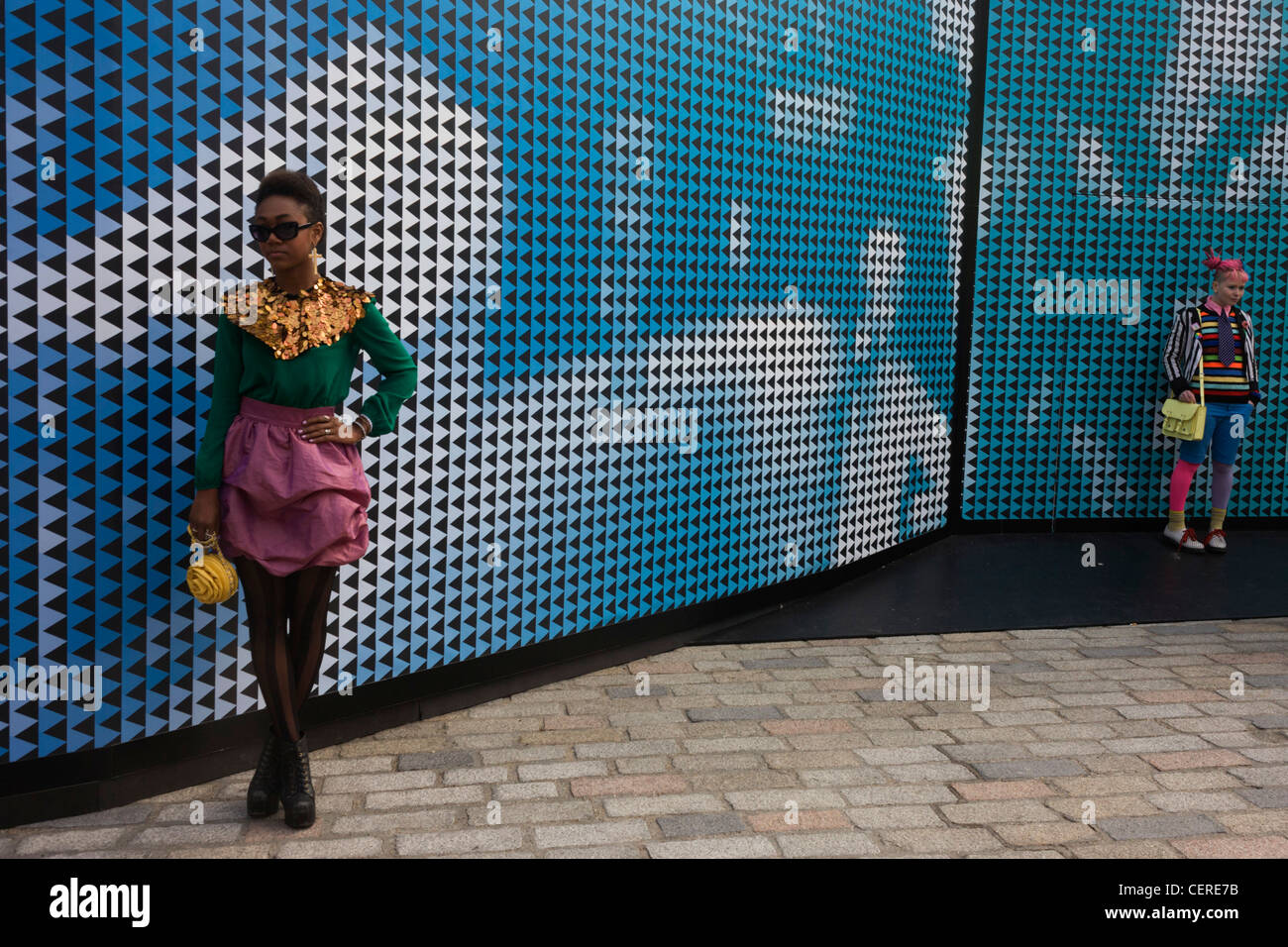 Female models attending London Fashion Week's 2nd day, each pose Stock  Photo - Alamy