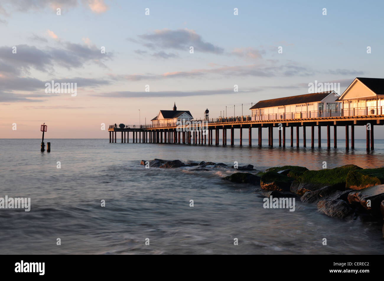 Southwold Pier at sunrise. The pier was originally constructed in 1900 and was rebuilt in 2001 making it Britain's only 21st Cen Stock Photo