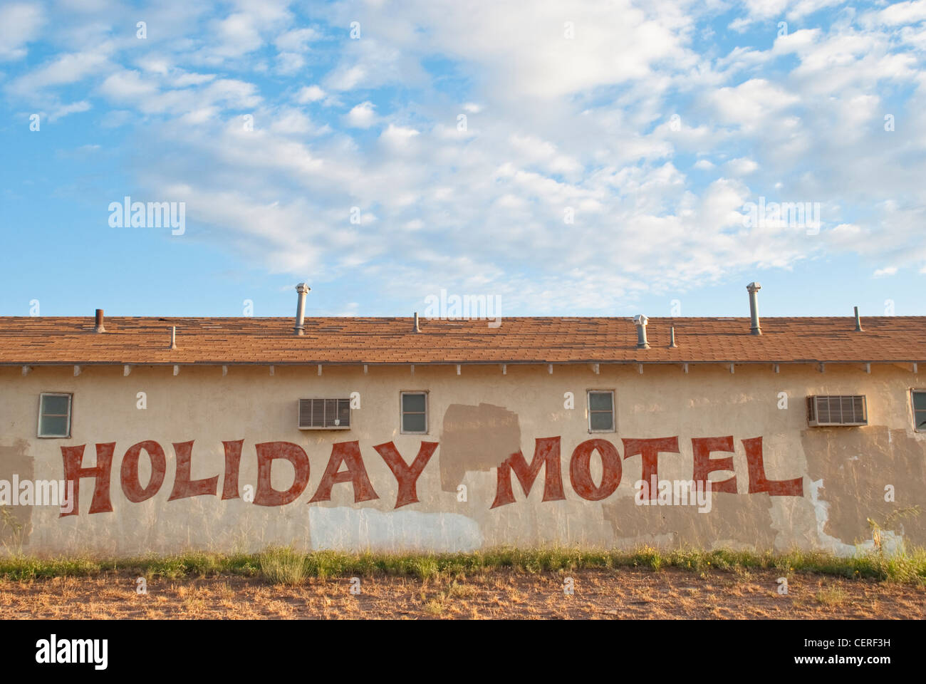 The Holiday Motel is a thing of the past just off old Rt 66 in Tucumcari, New Mexico. Stock Photo