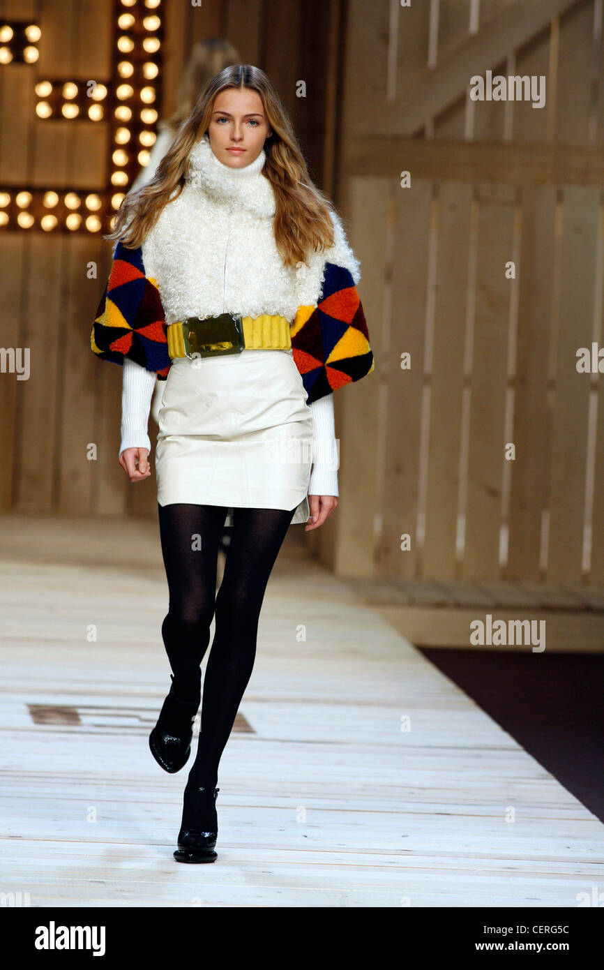 Fendi Milan Fashion Week Autumn Winter Model Valentina Zelyaeva wearing cream leather mini skirt split hems, cream furry Stock Photo