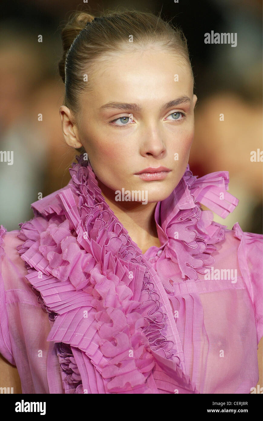 Yves Saint Laurent Female model dark blonde hair pulled back