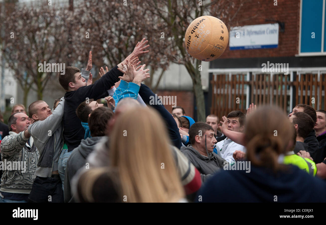 Atherstone ball game 2012. Action on Long street during the game. Stock Photo