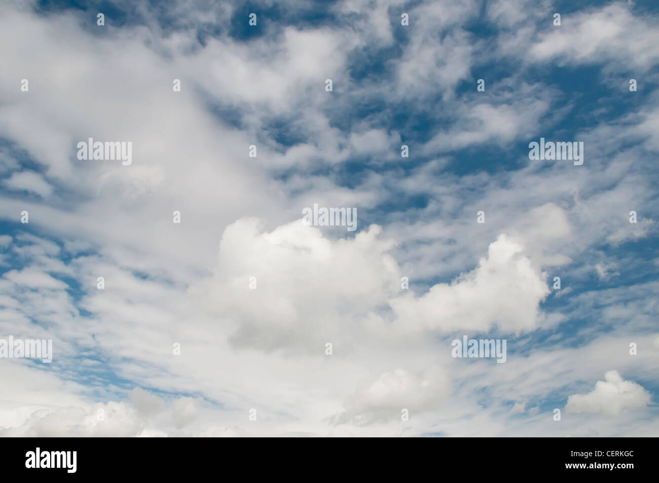 Blue sky with fluffy white clouds Stock Photo