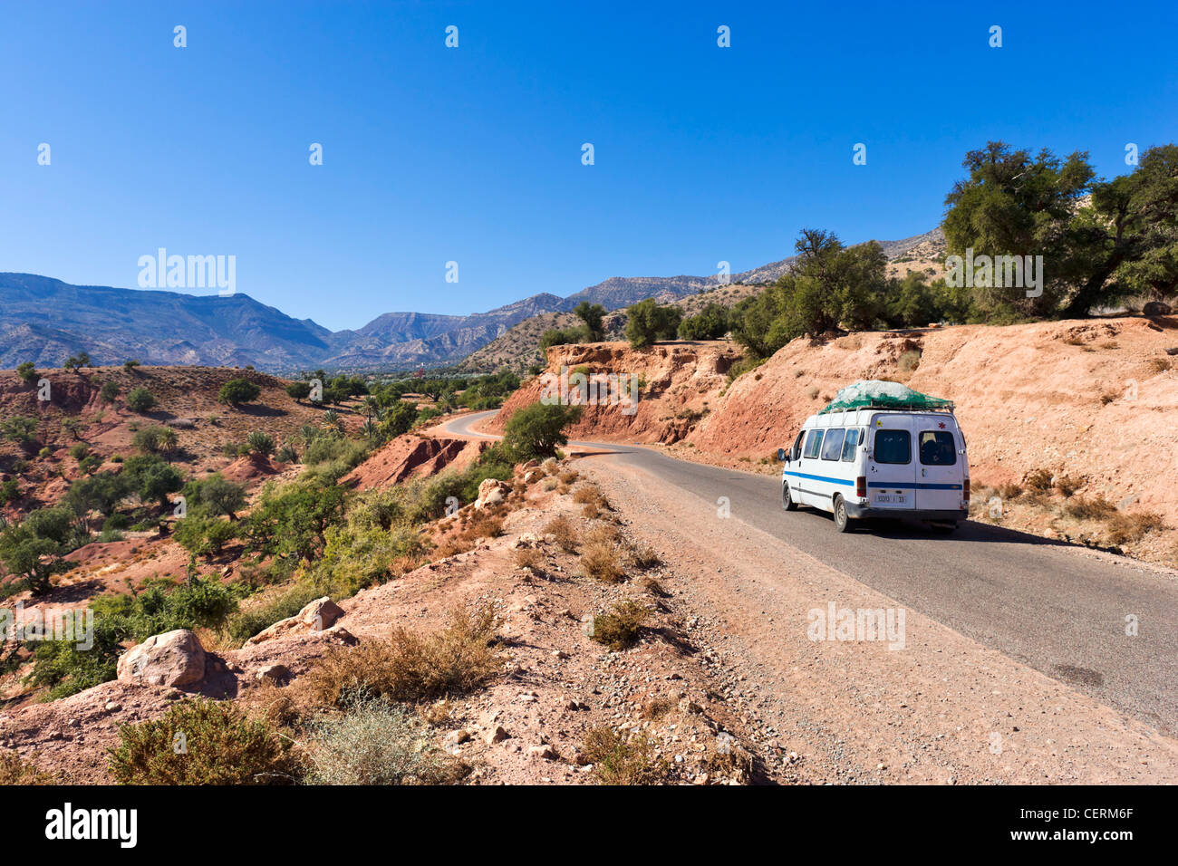 Van carrying passengers on 7002 mountain road between Agadir and Marrakech via Immouzer des Ida Outanane, Morocco, North Africa Stock Photo