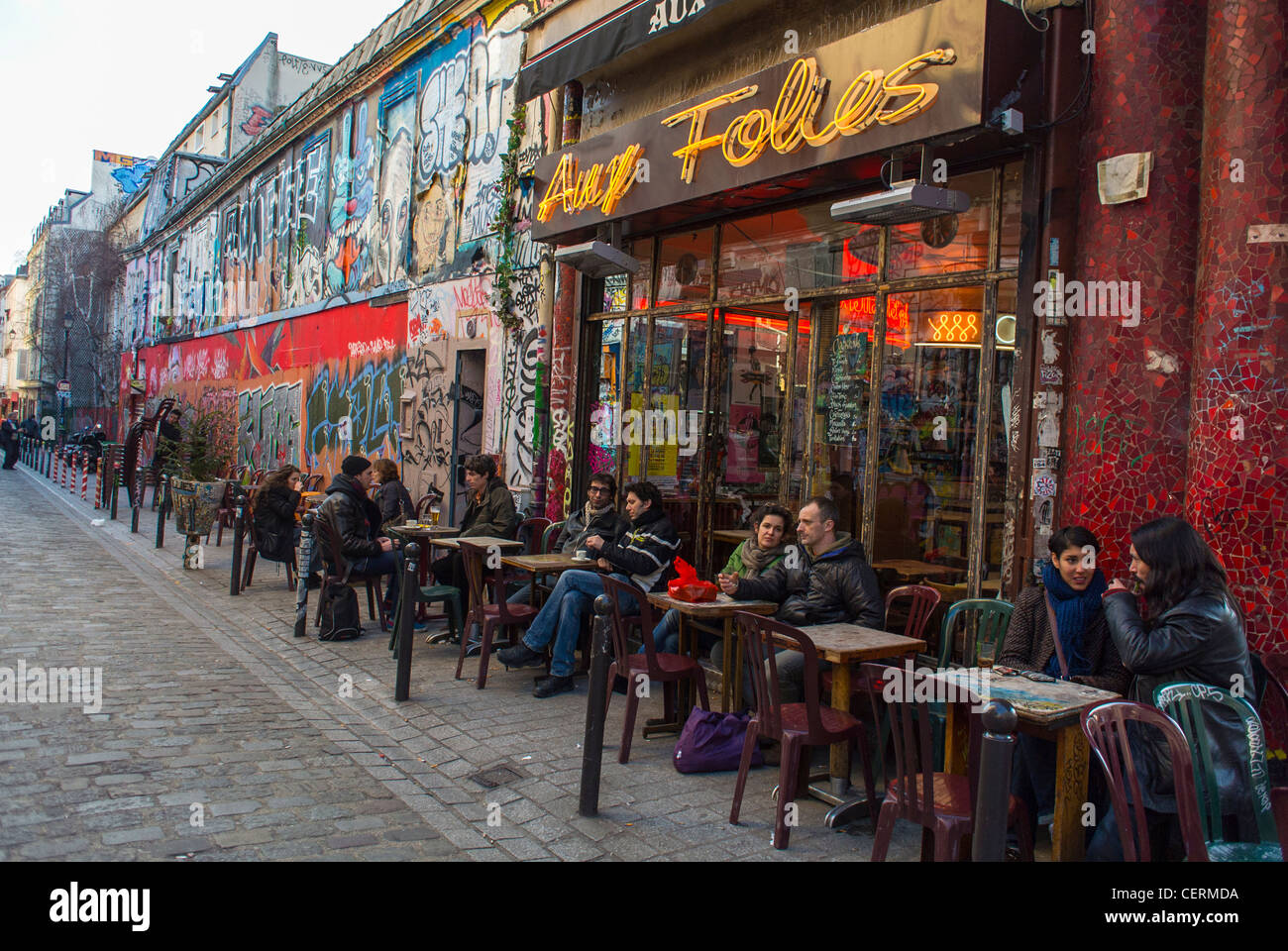 Paris, France, young Adults Sharing Drinks in Old French Vintage Cafe