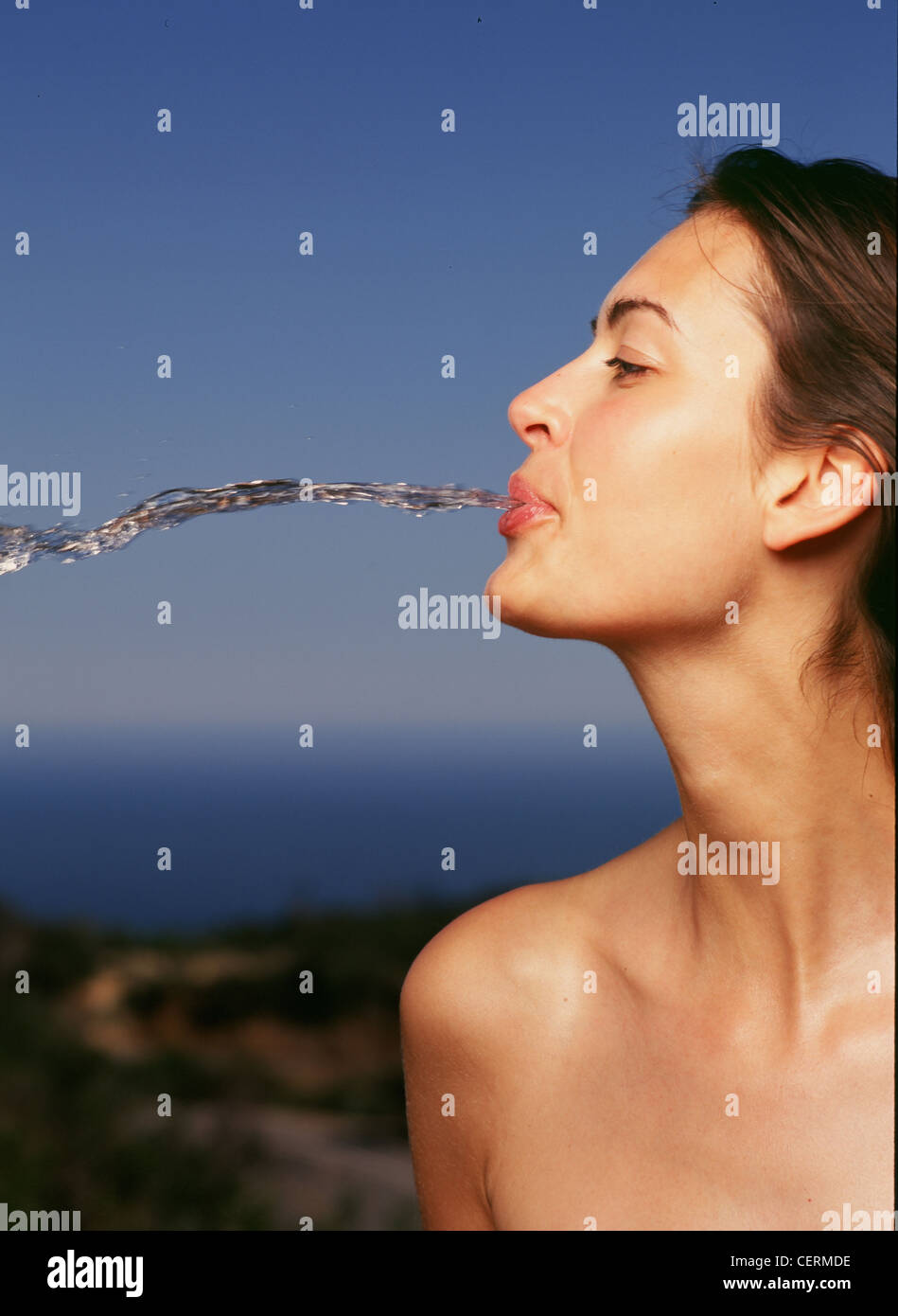 PM 53140 Female spitting water Stock Photo Alamy
