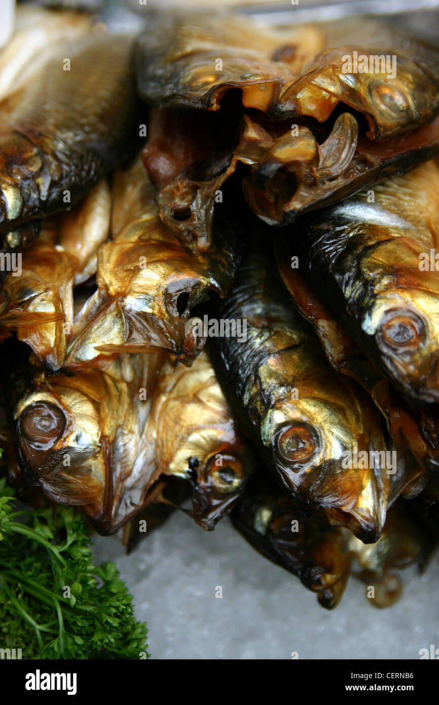 Smoked herrings for sale on a market stall Stock Photo Alamy
