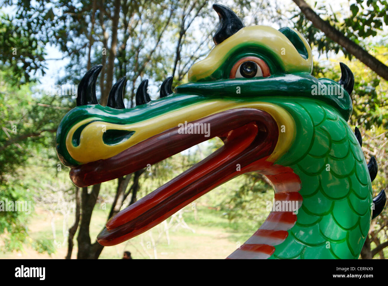 Funny Dinosaur Dragon Model rides in Kerala,India Stock Photo