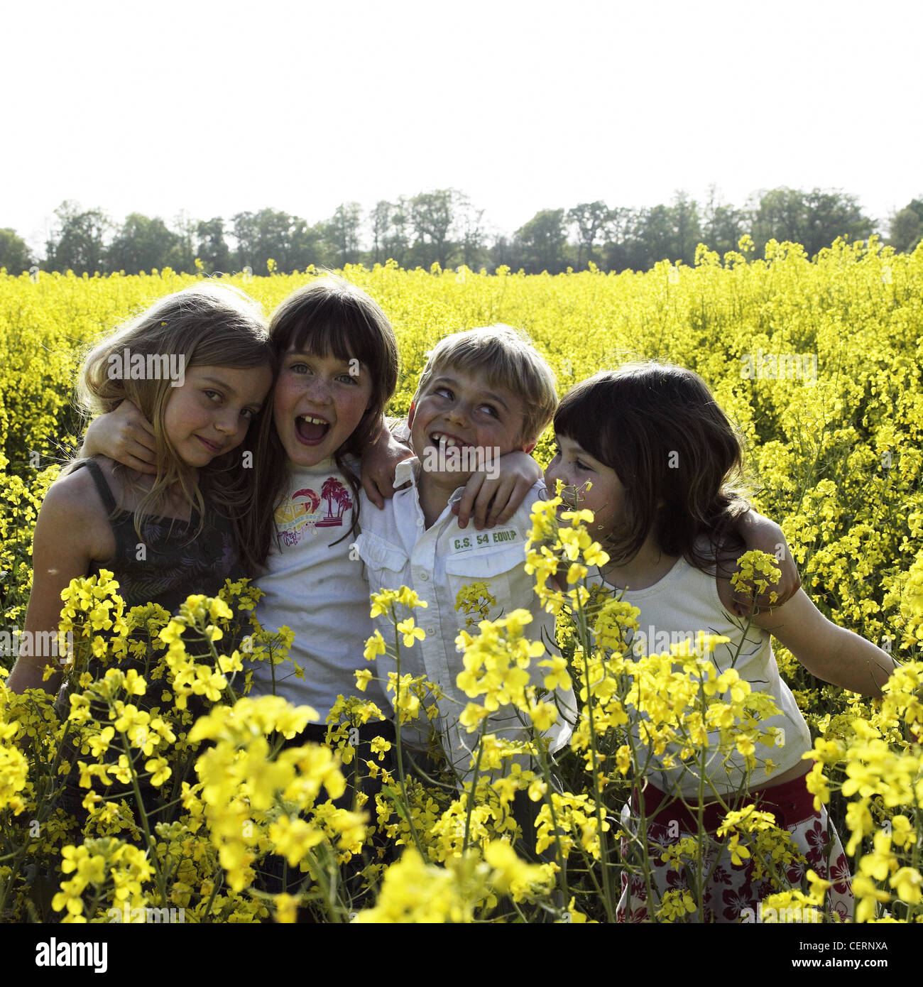 Children standing arms around other hi-res stock photography and images ...
