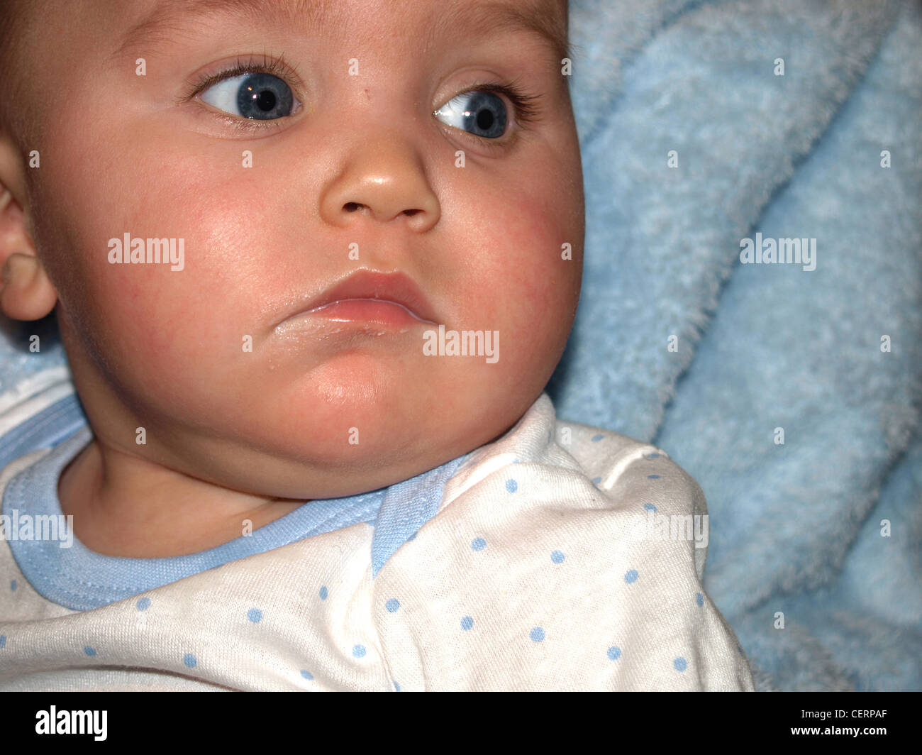 Male baby with milk around mouth Stock Photo Alamy