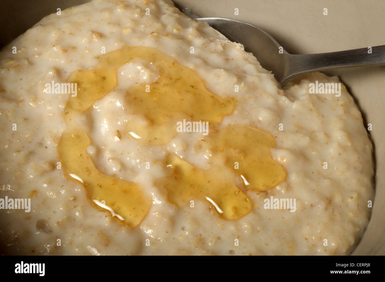 Porridge oats with honey Stock Photo - Alamy