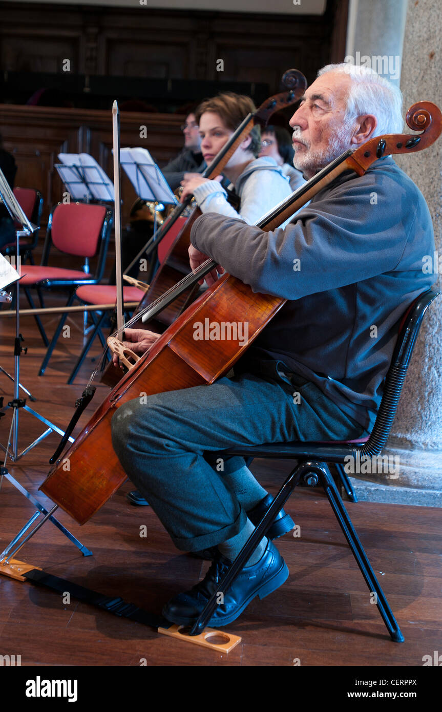 A violoncello player during practice Stock Photo