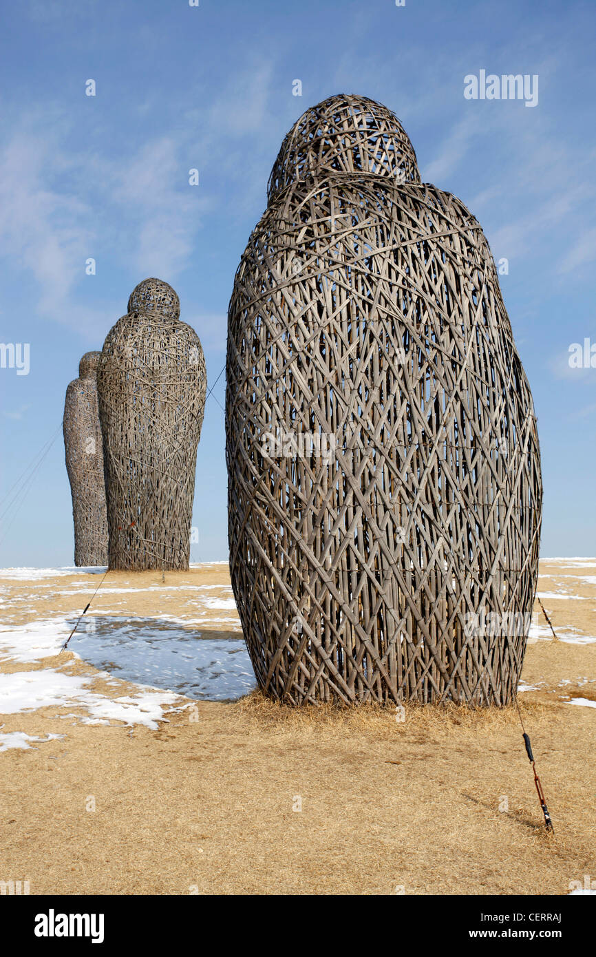 Looking towards Unity installation art sculpture statues of anonymous