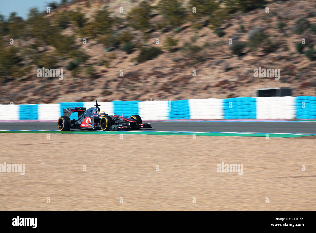 Lewis Hamilton driving McLaren Mercedes F1 race car during Formula One track testing at Jerez circuit Andalucia Spain Stock Photo