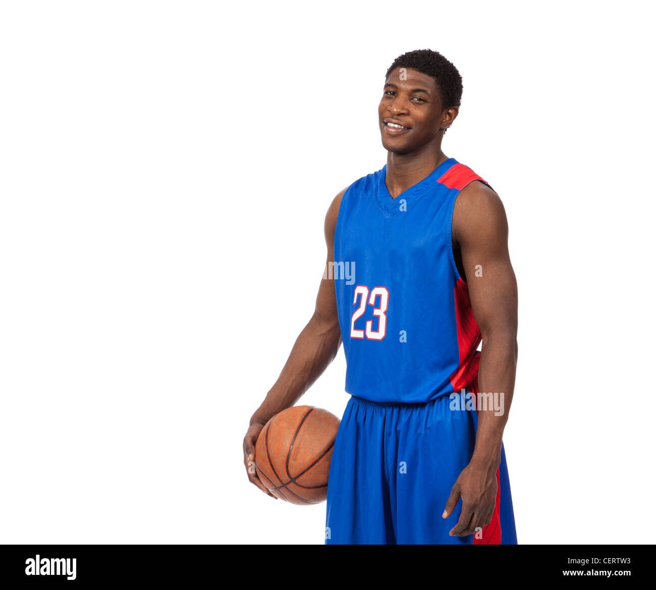 Male Basketball player in blue uniform on white background Stock Photo