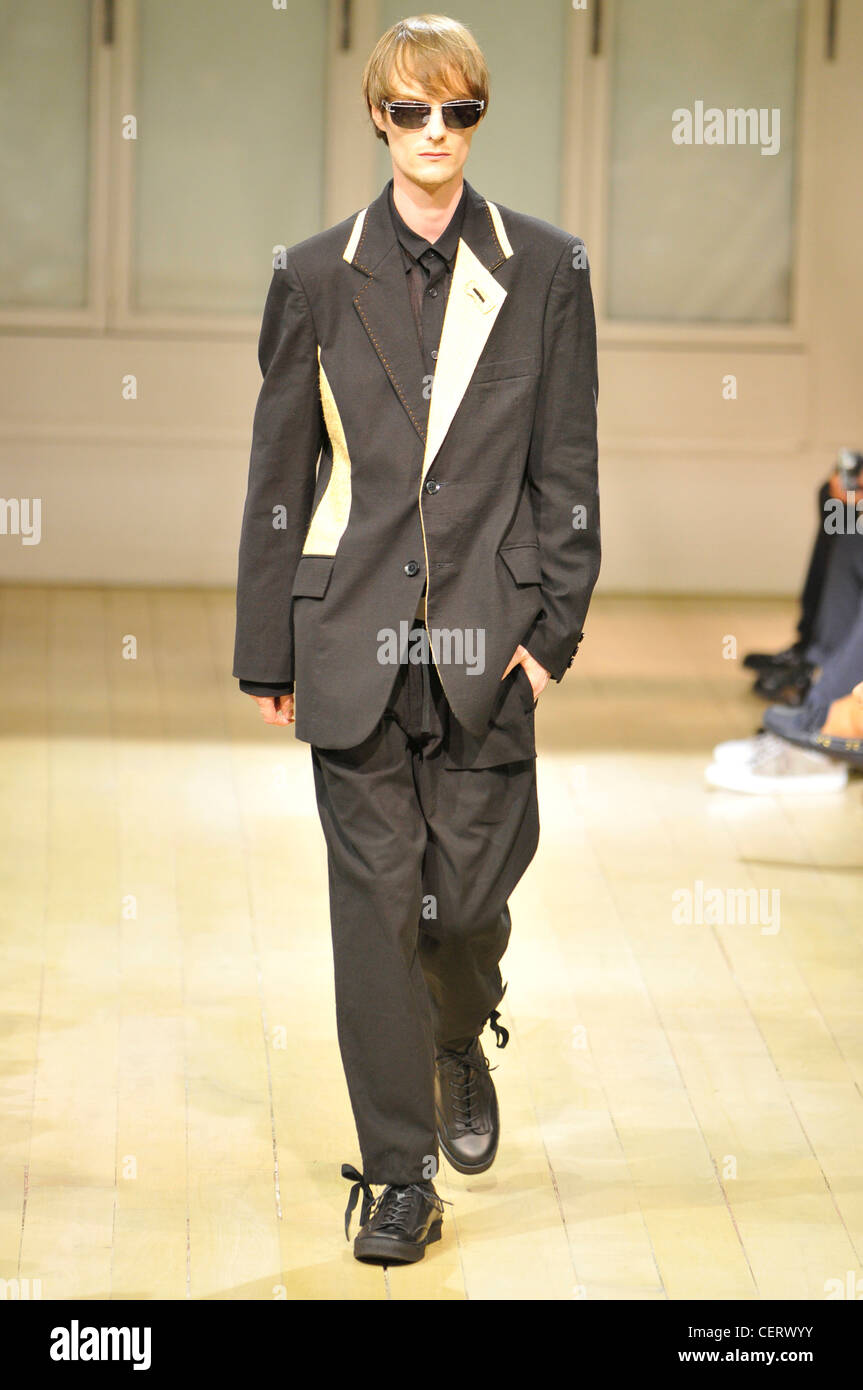 Yohji Yamamoto Paris Menswear Spring Summer Model wearing an oversized ...