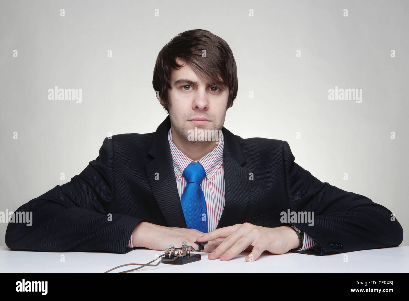Man Using Morse Code businessman using a morse code key to communicate with someone Stock ...