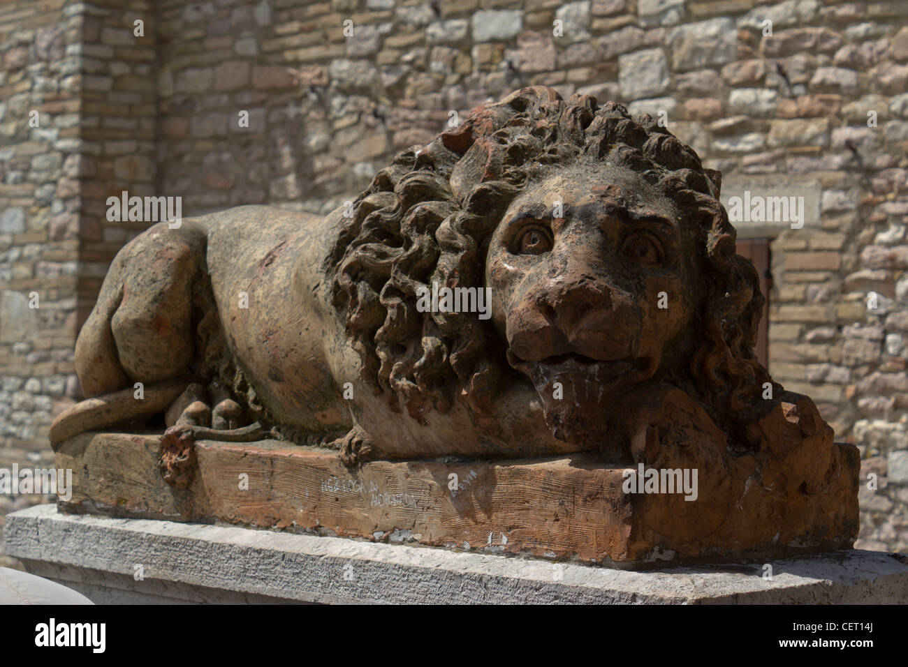 Stone lion in Assisi, Umbria, Italy Stock Photo - Alamy