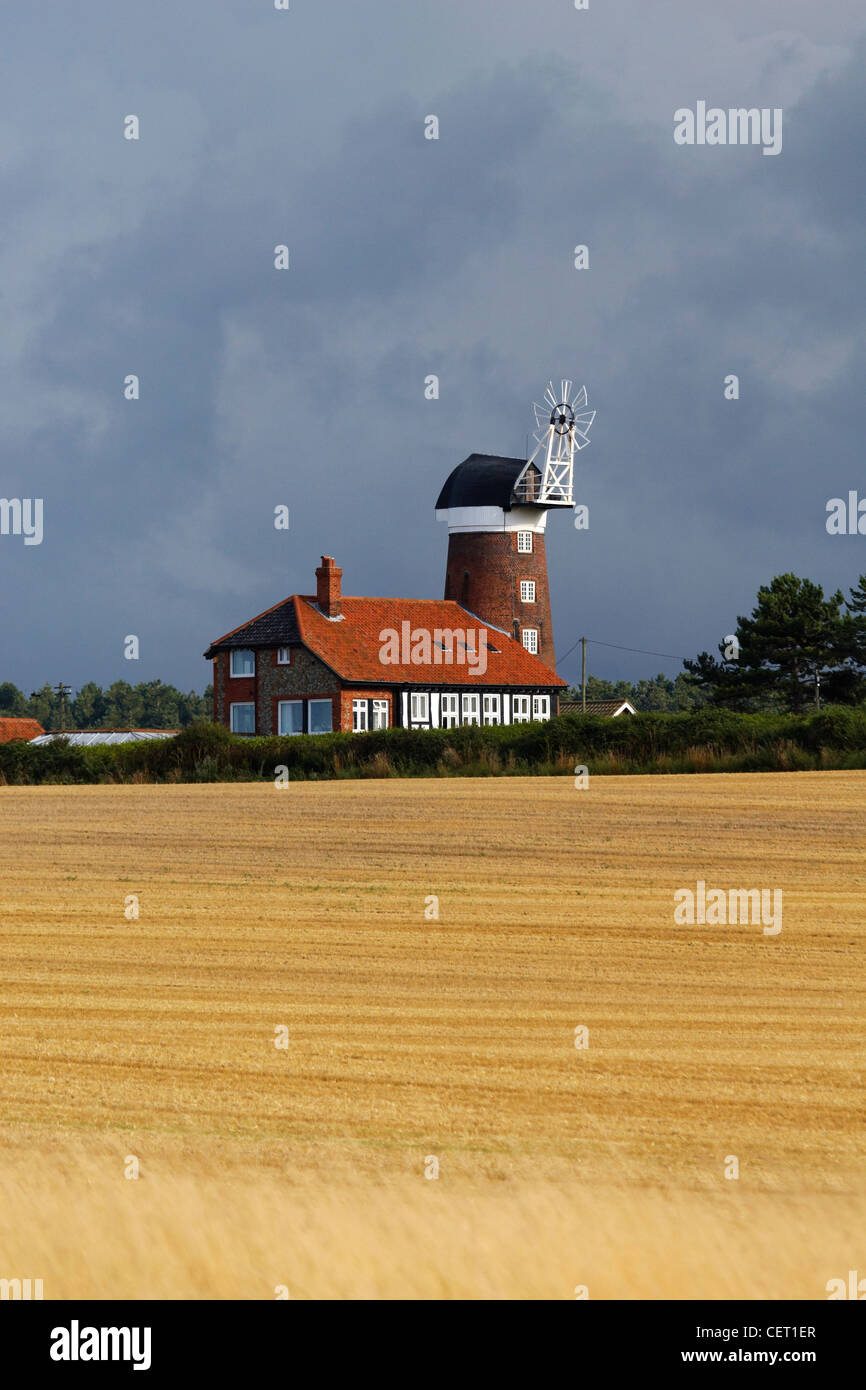 A storm passes over Weybourne Towermill in Norfolk. Stock Photo
