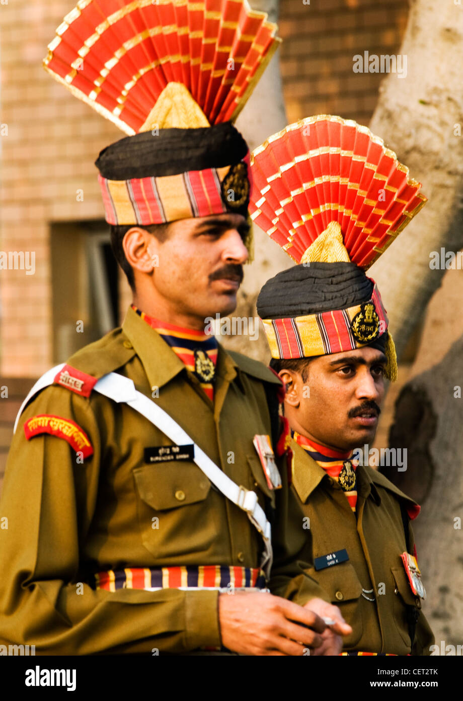 colorful Indian border guards during the daily 'closing the border 'ceremony in Attari- Wagah in Punjab. Stock Photo