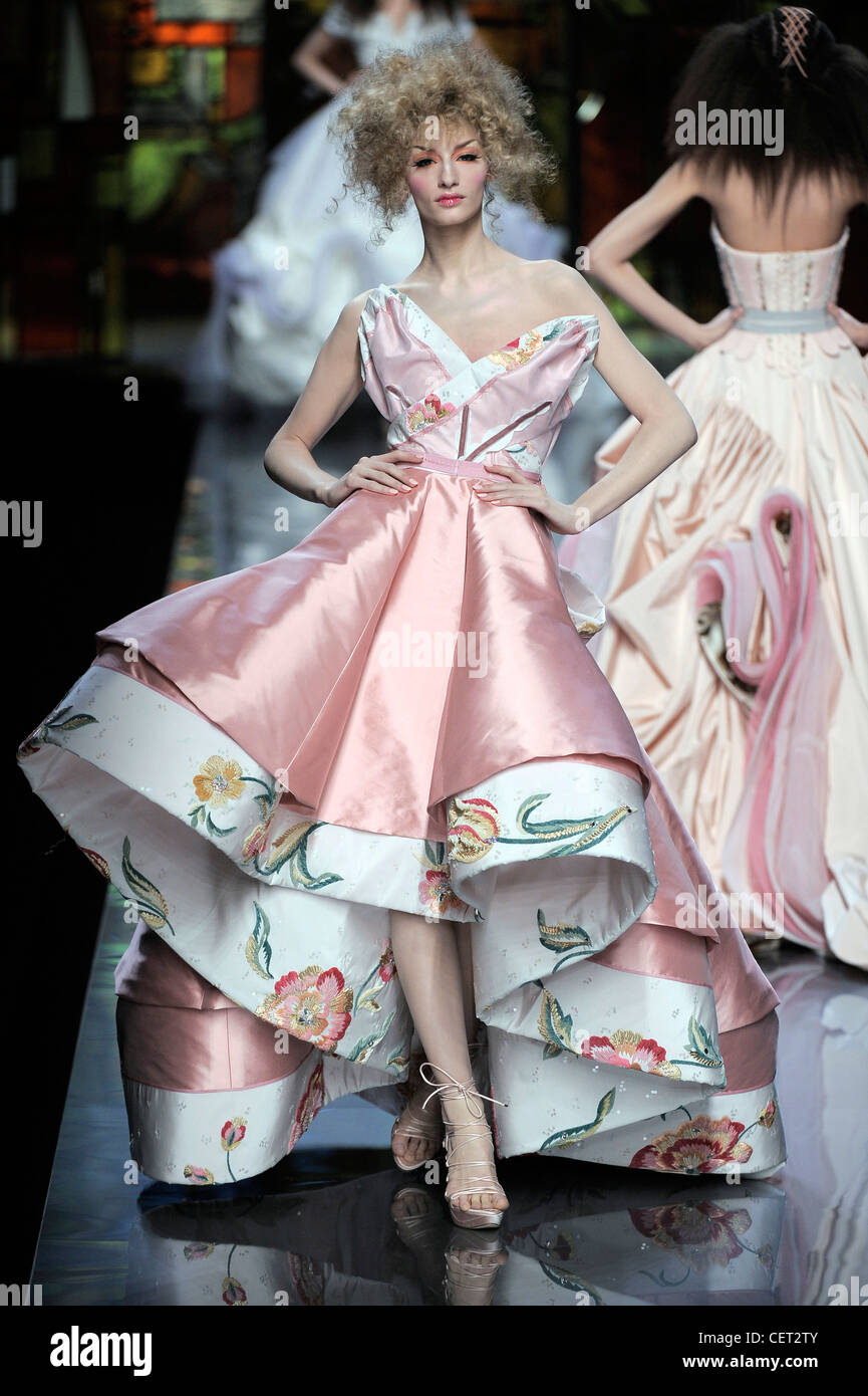 Christian Dior Paris Haute Couture Spring Summer Female curly updo wearing  voluminous pink taffeta and floral print strapless Stock Photo - Alamy