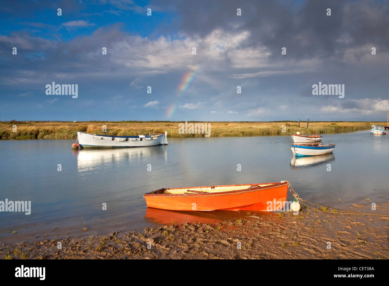 A rainbow over the small fishing harbour at Morston on the North Norfolk Coast. Stock Photo