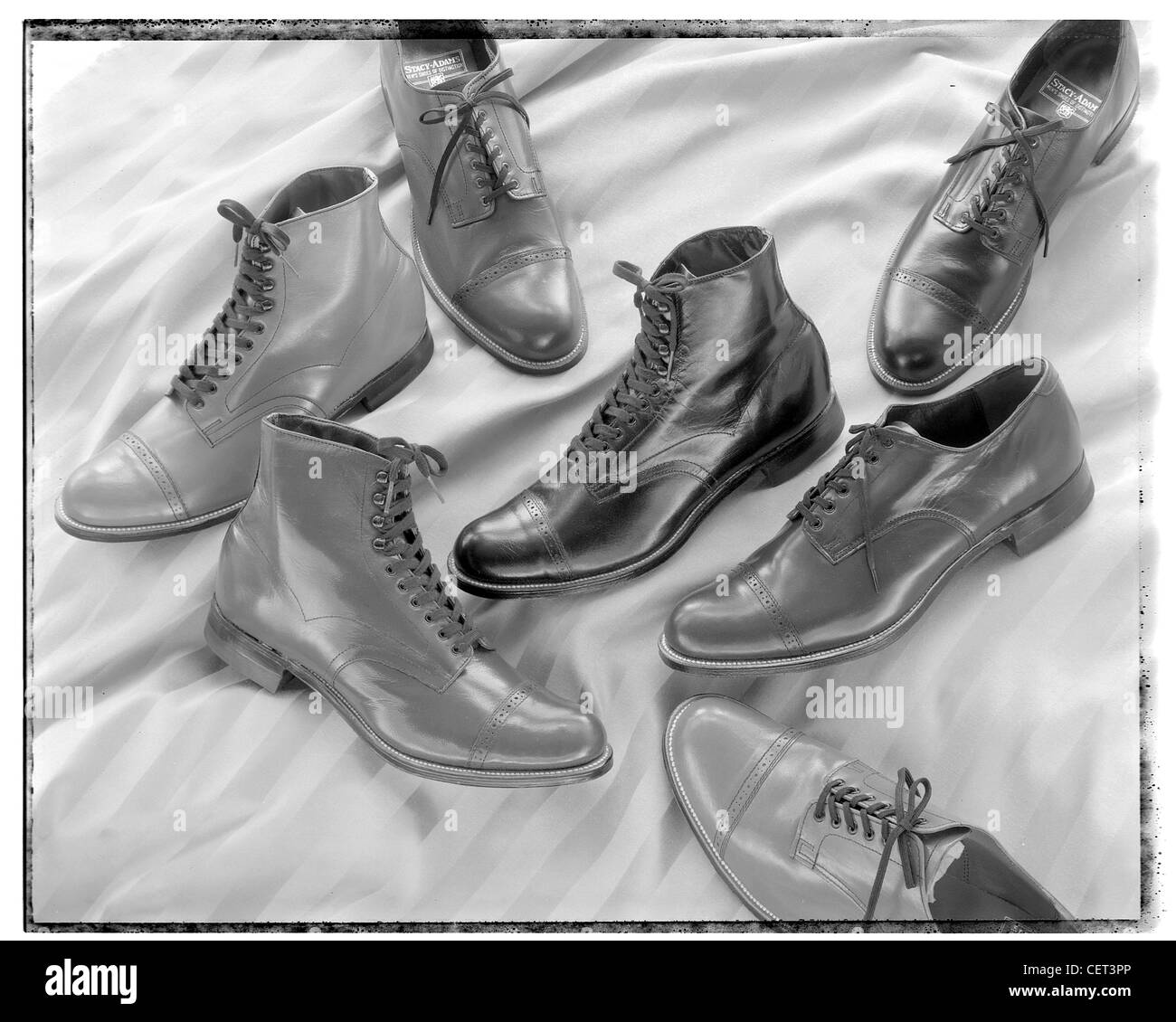 Stacey Adams Shoes, retro, design style group still life on material background.  boots, shoes, laces  classic horizontal Stock Photo