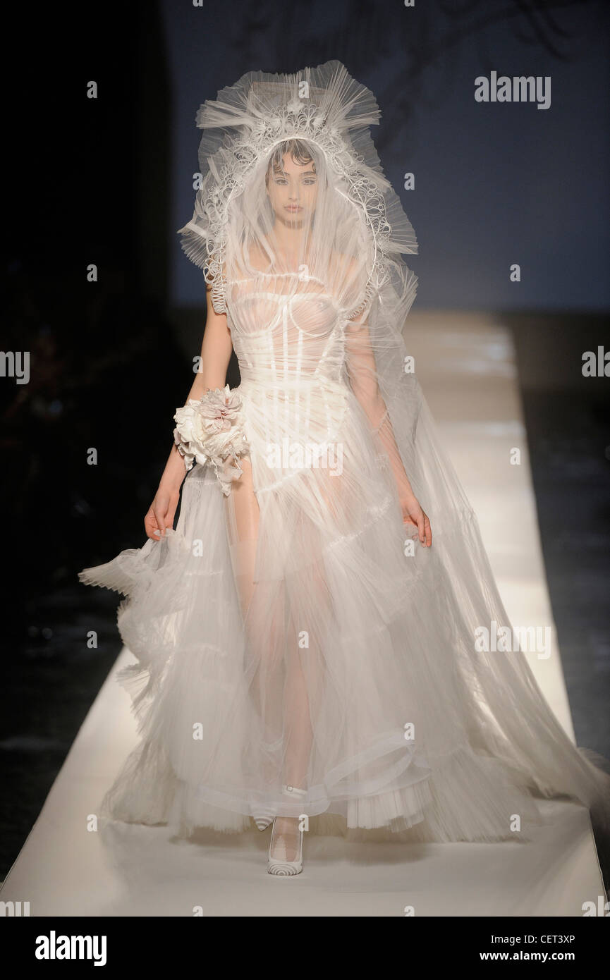 Jean Paul Gaultier Paris Haute Couture Spring Summer White tulle corsetted  wedding gown with matching veil Stock Photo - Alamy