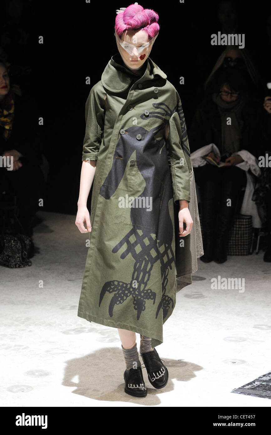 Comme des Garcons Paris Ready to Wear Autumn Winter Ankle length asymmetric green double breasted coat black pattern grey Stock Photo Alamy