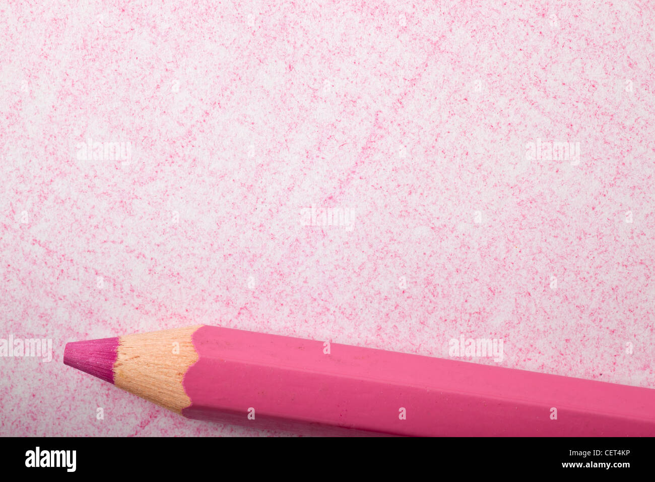 Pink color pencil with pink shading background Stock Photo