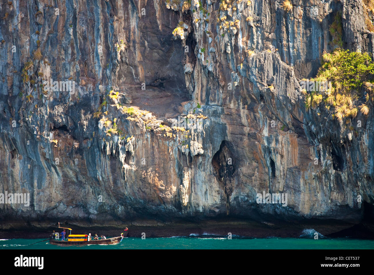 Tourists in a boat on Ko Phi Phi Island, Thailand Stock Photo