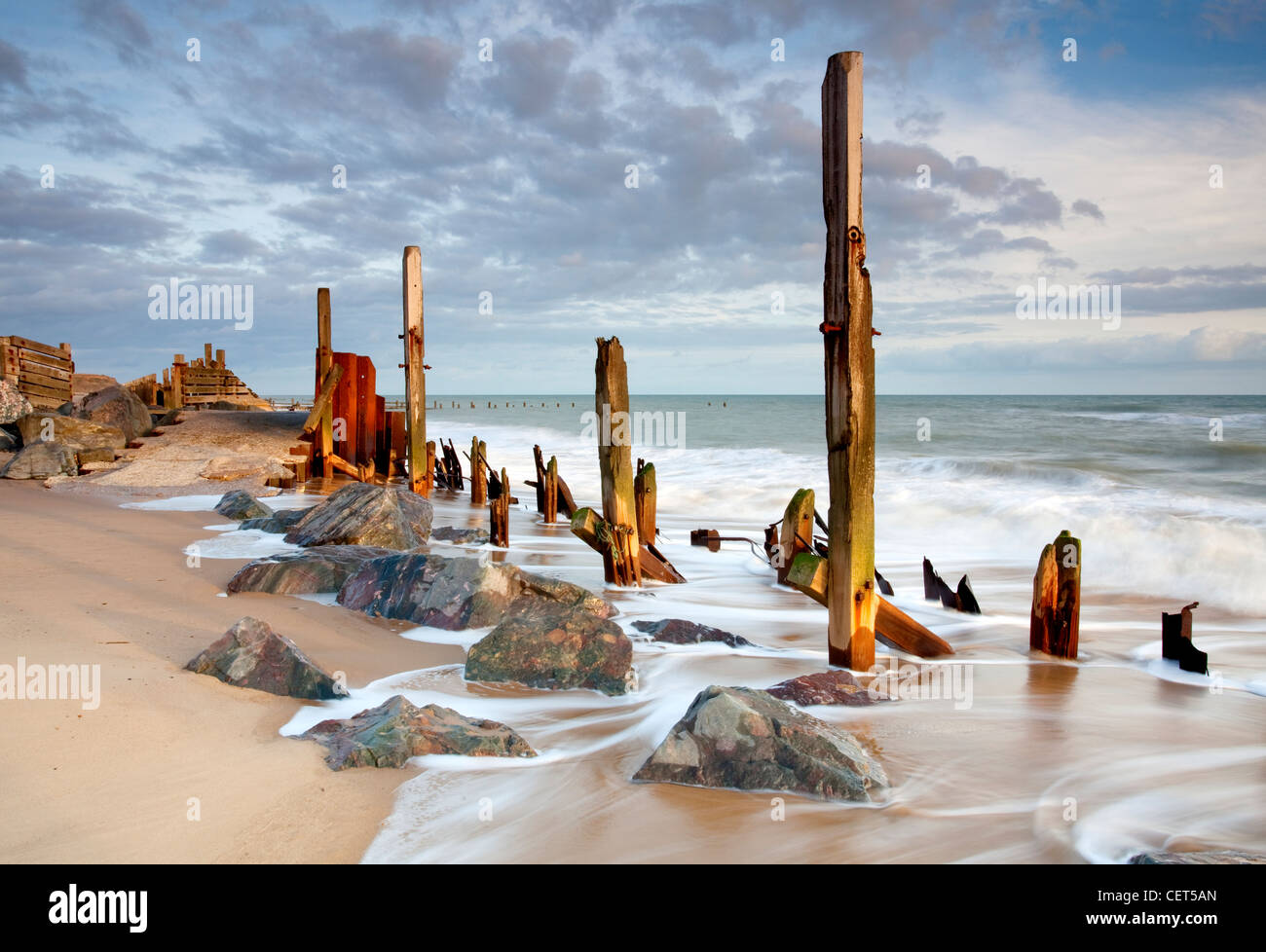The remains of the now damaged sea defences at Happisburgh on the Norfolk Coast. Stock Photo