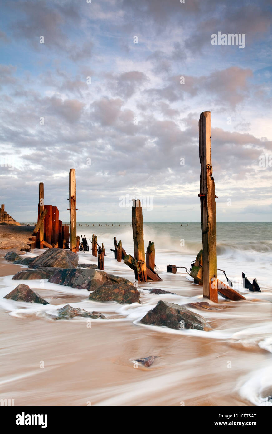 The remains of the now damaged sea defences at Happisburgh on the Norfolk Coast. Stock Photo