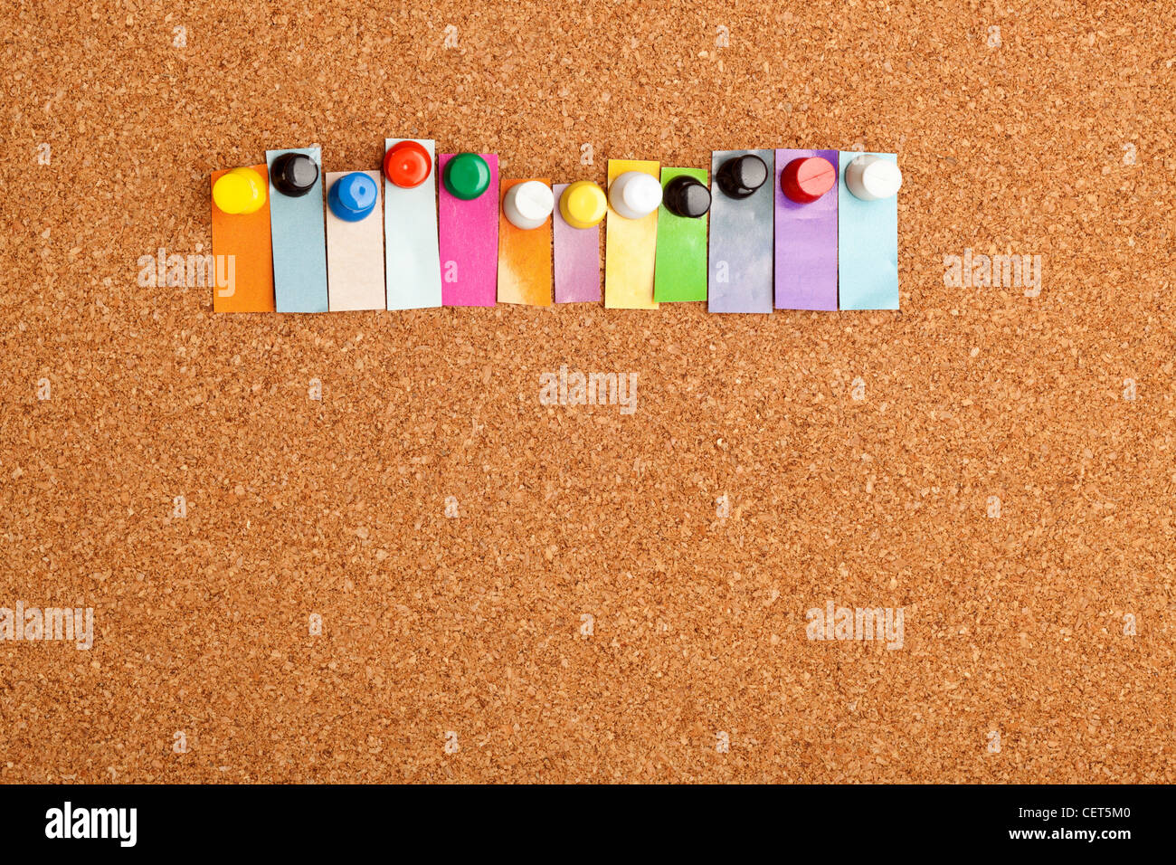 Cork board and colorful heading with copyspace for a twelve letter word Stock Photo