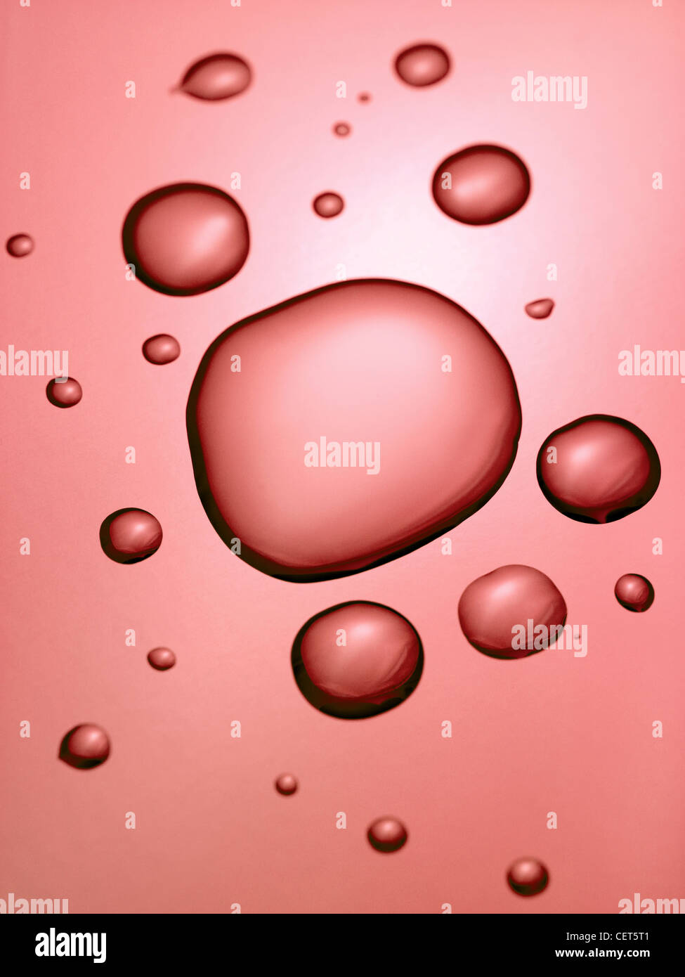 Water droplets isolated on a blue background Stock Photo - Alamy