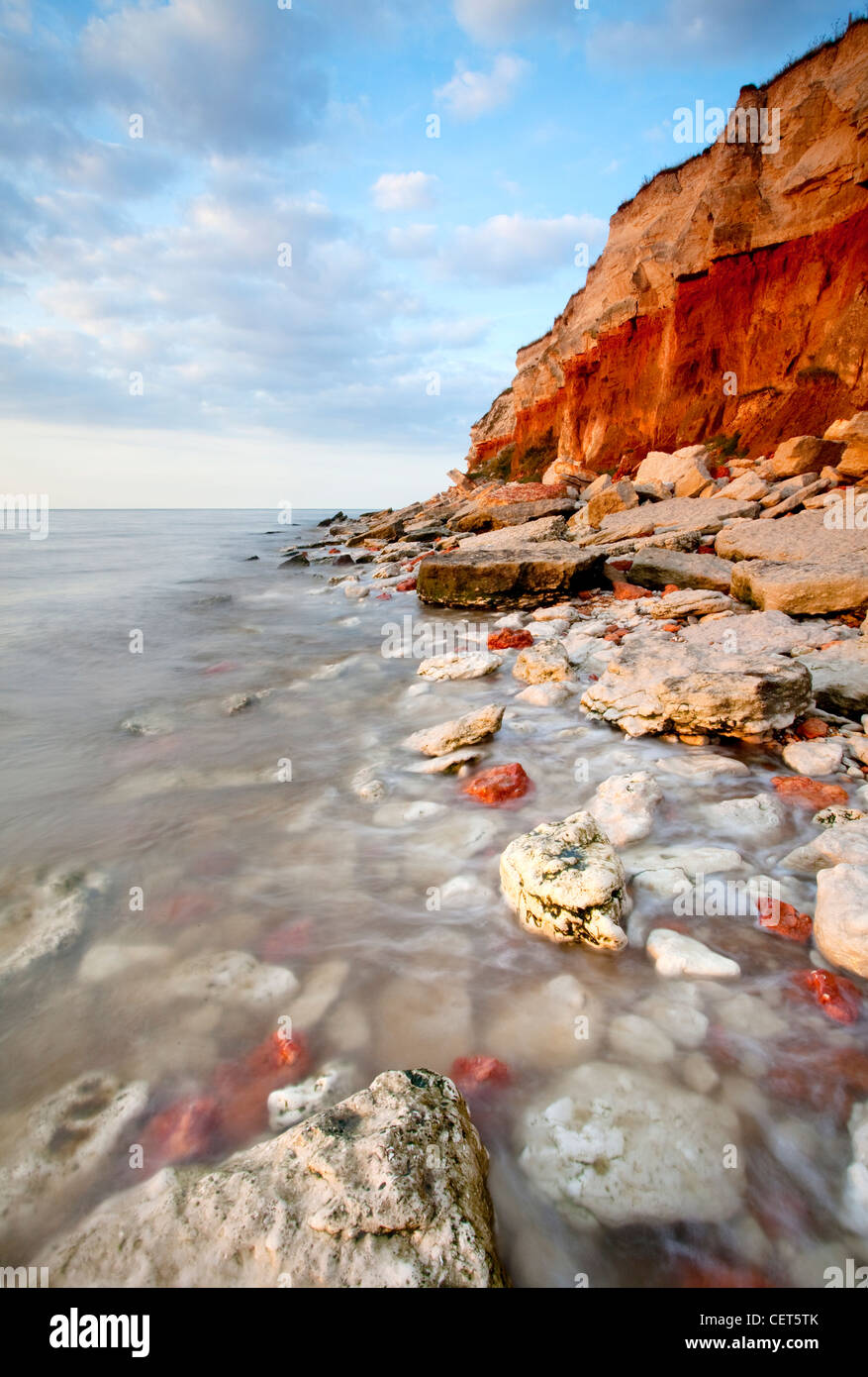 Last light illuminating the stratified red chalk limestone and white