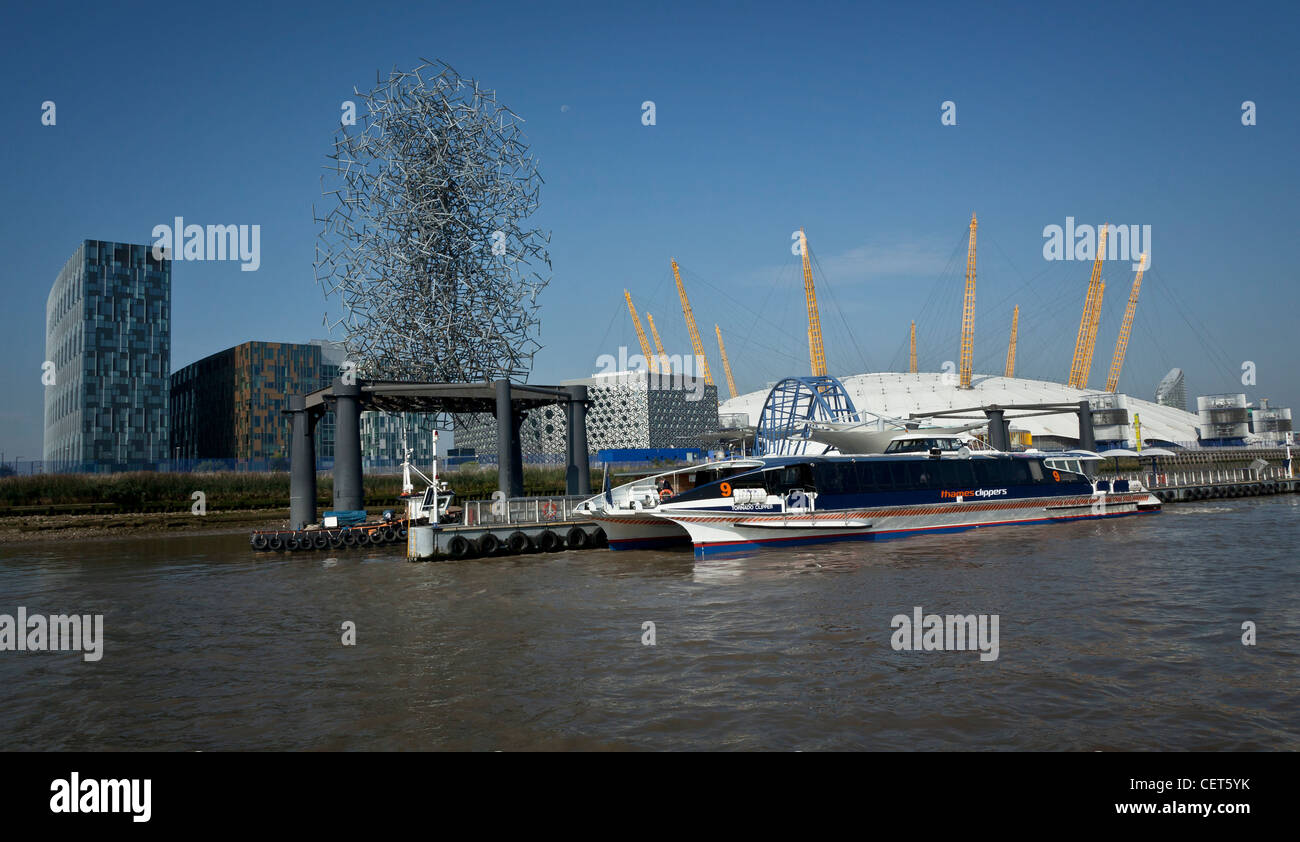 Millenium Dome and a Thames clipper photographed from a boat on the Thames Stock Photo